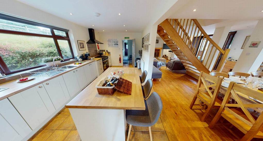 An Alternative view of the rustic kitchen in the Forest Tree House