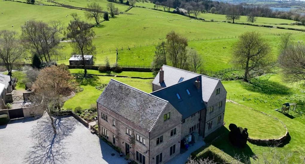 Luxury 10-bedroom hen accommodation at Godfrey Manor featuring private hot tub and tennis courts.