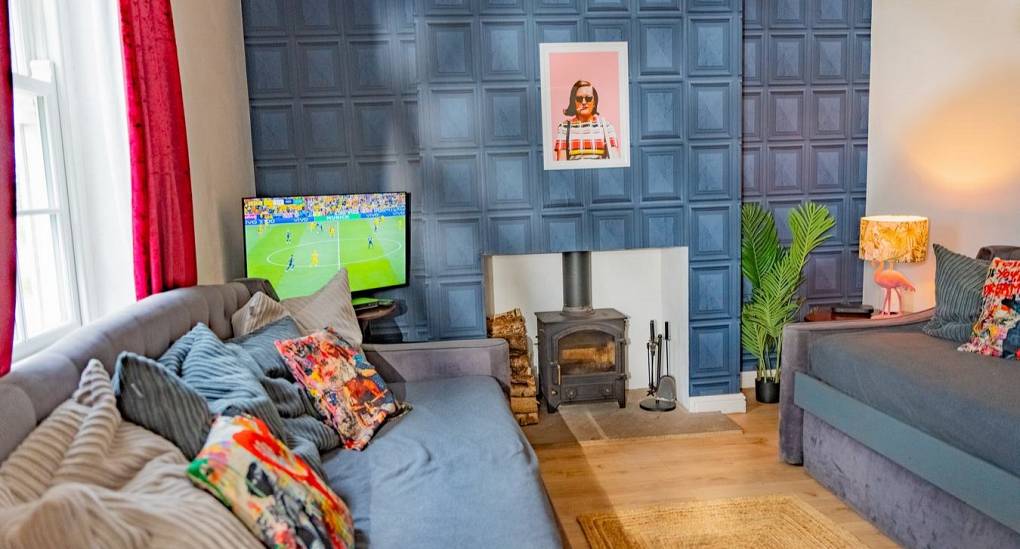 twon sofa beds and fire place in lounge 