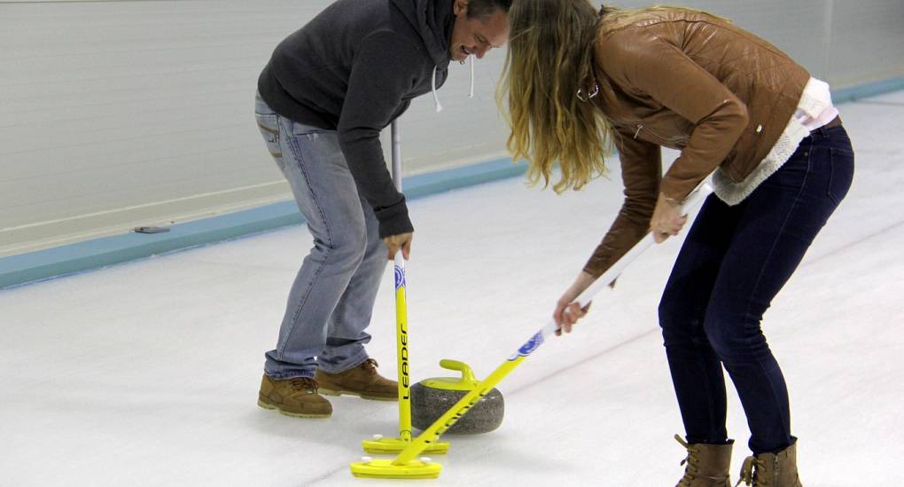Couple enjoying Curling 