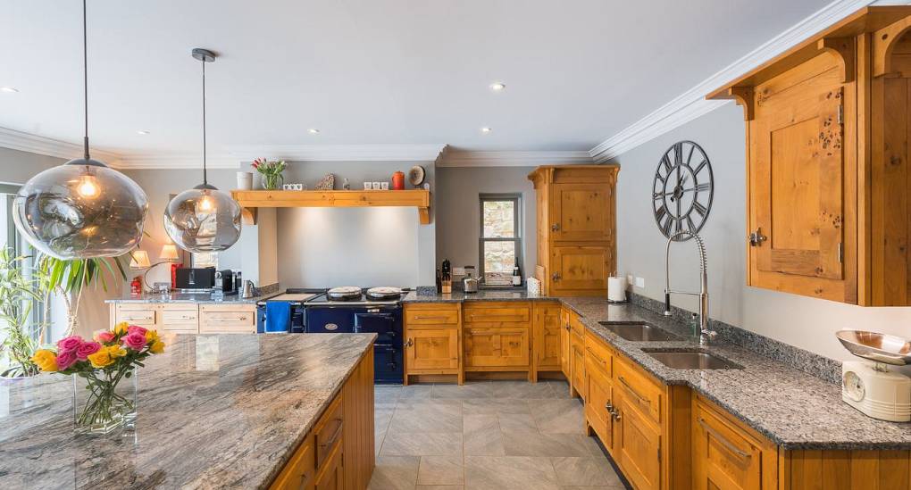 Long view of the kitchen with drop lights