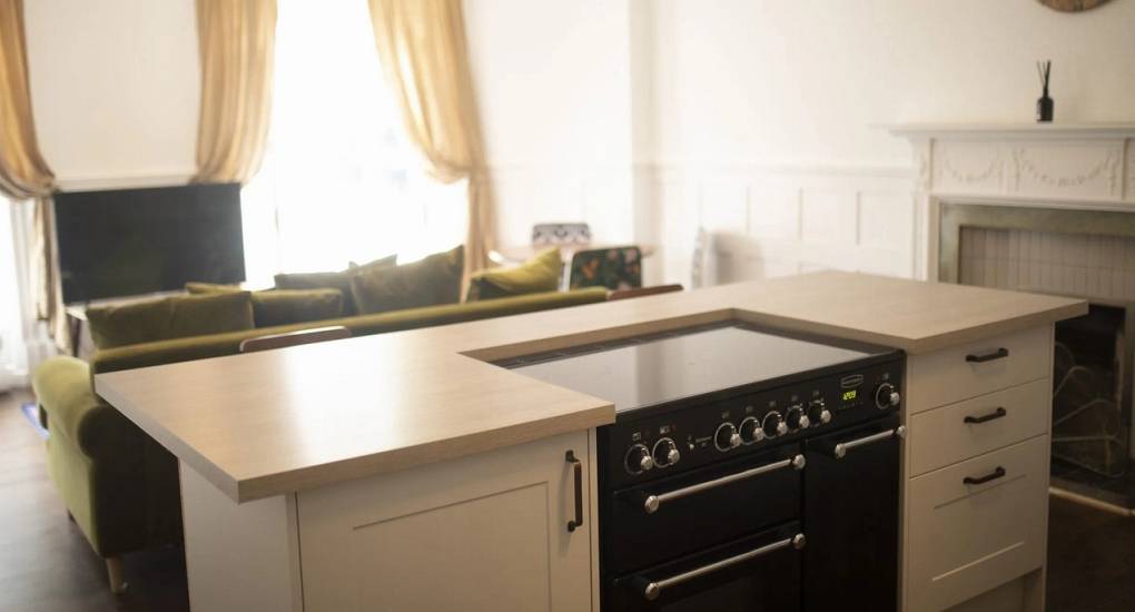 Modern kitchenette at Lux Life Edinburgh with essential appliances and a sleek finish, perfect for self-catering Edinburgh city centre hen parties in a luxury group townhouse.