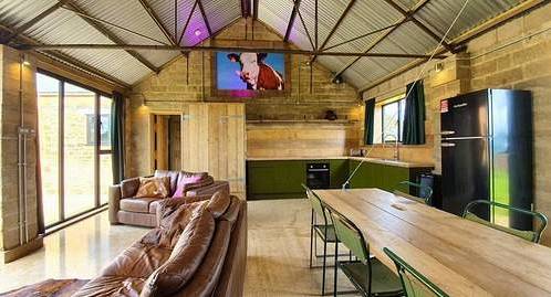 The open plan kitchen and lounge at Rustic Lets, secluded hen party cottages near Oxford sleeping 10.