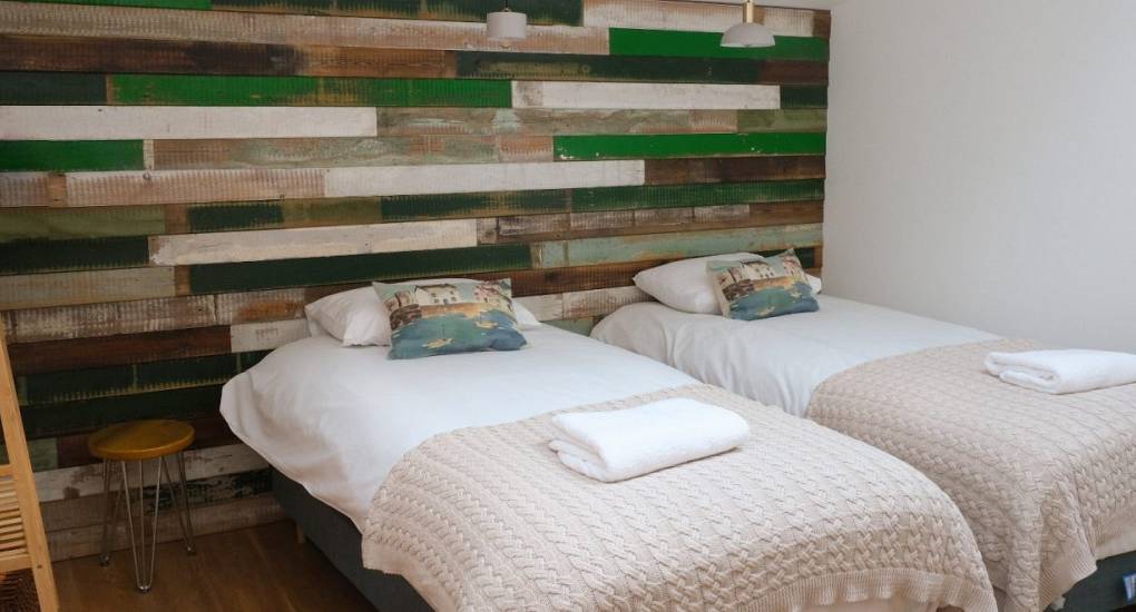 Luxury bedroom with en-suite shower room at Tree View Peak District Hen Do house